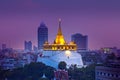 Night Urban City Skyline, Saket Temple (Golden mountain), Landmark of Bangkok, Thailand.