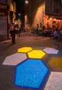 Night urban life and floor light projection in Grenoble, France