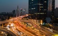 Night view aerial shot of a group of tall buildings along the Han River in Wuhan, China.