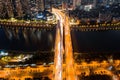 Night view aerial shot of a group of tall buildings along the Han River in Wuhan.