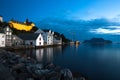 Night view of Alesund. Beautiful lights and reflections in sea. Norway Royalty Free Stock Photo