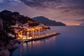 Night view of Amalfi cityscape on coast of mediterranean sea, Italy