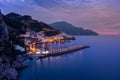 Night view of Amalfi cityscape on coast of mediterranean sea, Italy