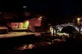 Night view of the Ambroz river as it passes through the Jewish Quarter of Hervas with the Roman bridge of Fuente Chiquita