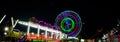 Night View of Amusement park rides, Ferris Wheel Royalty Free Stock Photo