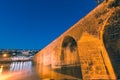 Night view of ancient stone ten eyed bridge