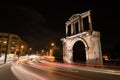 Night view Arch of Hadrian that leads to the pillars of Zeus`s archaeological site.