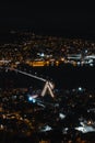 Night view of Artic Cathedral from the side of the hill. Tromso city under the cover of darkness. Norwegian Nordic city beyond the Royalty Free Stock Photo