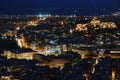 Night view of Athens and Acropolis, Parthenon and Erechtheion, Hellenic Parliament in city lights. Famous iconic view of