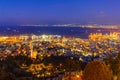 Night view of Bahai Shrine, gardens, downtown and port, Haifa Royalty Free Stock Photo