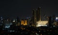 Night view of Bangkok, Thailand, filled with many tall buildings