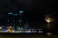 Night view of beach with city background Royalty Free Stock Photo