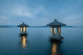 Night view of the beautiful landscape in West Lake in Hangzhou, with two stone lanterns in the lake Royalty Free Stock Photo