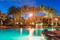 Night view of Beautiful swimming pool and palm trees in Egypt Royalty Free Stock Photo