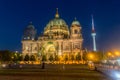 Night view of Berlin Cathedral and Television Tower seen from Lustgarten.