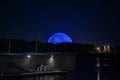 Night view of The Biosphere Environment Museum illuminated in blue light in Montreal. Royalty Free Stock Photo