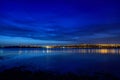 Night view at blue hour of Galati City, Romania with reflections Royalty Free Stock Photo