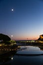 Night view on the bridge and bay on the coast of the Ligurian Sea near Genoa, Italy Royalty Free Stock Photo