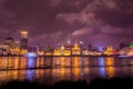 Night view of the bund at a cloudy day after raining with golden light in Shanghai, China Royalty Free Stock Photo