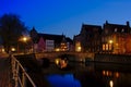 Night view on a canal with historical houses in Bruges Royalty Free Stock Photo