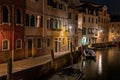 Night view of canal in Venice, Italy. Architecture and landmarks of Venice. Night life of Venice. Venice postcard with Royalty Free Stock Photo