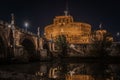 Night view of Castel Sant'Angelo on the bank of the Tiber River in Rome, Italy Royalty Free Stock Photo