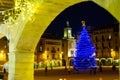 Night view of central square of Vic Placa Major with main Christmas tree Royalty Free Stock Photo