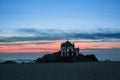 Night view of Chapel Senhor da Pedra at Miramar Beach, near Porto