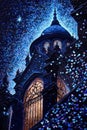 Night view of church or cathedral, dark blue starry sky, atmospheric magical glowing background Royalty Free Stock Photo