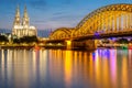 Cologne Cathedral and Hohenzollern Bridge at night, Germany Royalty Free Stock Photo