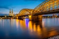 Cologne Cathedral and Hohenzollern Bridge at night, Germany Royalty Free Stock Photo