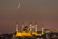 Night view with crescent moon of the Mosque of Sultan Ahmet, the Blue Mosque ramadan month mosque on the mahya, Istanbul, Turkey. Royalty Free Stock Photo