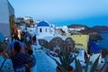 Night view of crowded narrow street Oia Santorini Greece Royalty Free Stock Photo