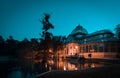 Night view of Crystal Palace or Palacio de cristal in Retiro Park in Madrid, Spain. Royalty Free Stock Photo