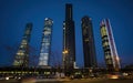 Night view of the Cuatro Torres Business Area, Madrid`s main financial area. The glass tower is the tallest in Spain, at 249