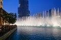 Night view Dancing fountains downtown and in a man-made lake in