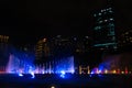 Night view of the dancing multi-colored fountains. Show of Singing Fountains