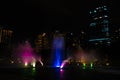 Night view of the dancing multi-colored fountains. Show of Singing Fountains