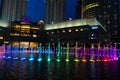 Night view of the dancing multi-colored fountains. Show of Singing Fountains