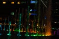 Night view of the dancing multi-colored fountains. Show of Singing Fountains