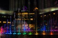 Night view of the dancing multi-colored fountains. Show of Singing Fountains