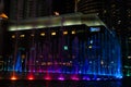 Night view of the dancing multi-colored fountains. Show of Singing Fountains