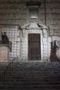 Night view of the door ofSaint Lawrence cathedral in Perugia with Pope Julius III statue