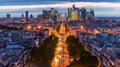 Night view of downtown of Paris with La Grande Arche de la Defense, view from the Arc de Triomphe at the Champs-Elysees Avenue in Royalty Free Stock Photo