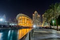 Night view of the Dubai Opera near the Burj Khalifa Tower, the tallest building in the world