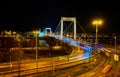 Night view on Elisabeth bridge and traffic lights of fast moving cars, Budapest, Hungary Royalty Free Stock Photo