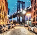 Night view of the Empire State Building through the pylons of Manhattan Bridge. View from Washington Street in Dumbo Royalty Free Stock Photo