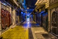 night view of an empty street in Plaka which is the old historical neighborhood of Athens, clustered around the northern Royalty Free Stock Photo