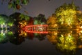 Night view of famous ancient wooden red-painted bridge in Hanoi Royalty Free Stock Photo
