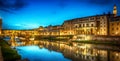 Night view of the famous bridge Ponte Vecchio and Gallery Uffizi on the river Arno in Florence, Italy. Royalty Free Stock Photo